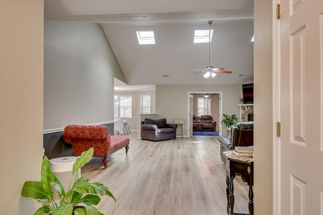 1457 Brown Rd, Hephzibah, GA 30815 - living room featuring ceiling fan, high vaulted ceiling, and wood finished floors