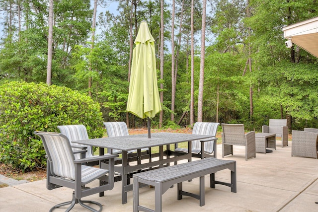 1457 Brown Rd, Hephzibah, GA 30815 - view of patio / terrace with outdoor dining area and view of wooded area