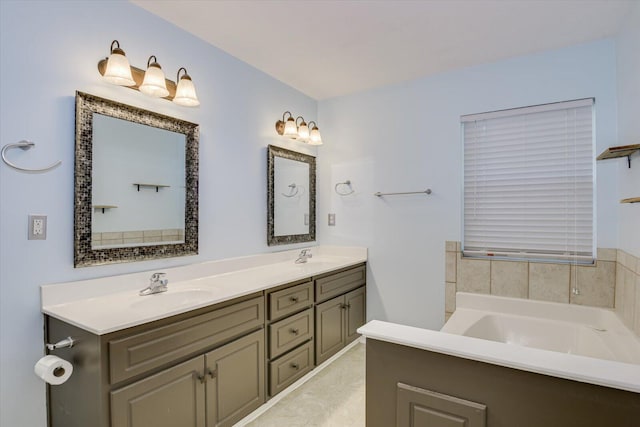 bathroom with a bathtub and vanity