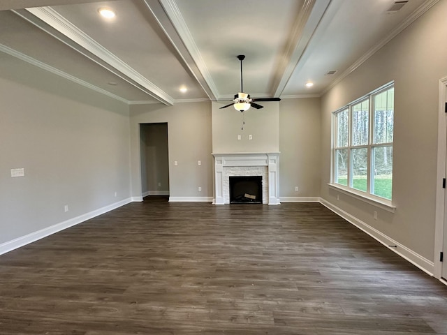 unfurnished living room with a fireplace, ornamental molding, ceiling fan, and dark wood-type flooring