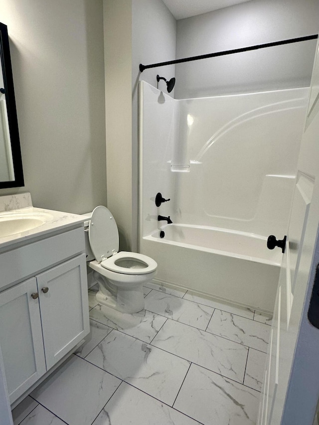 full bathroom with washtub / shower combination, vanity, and toilet