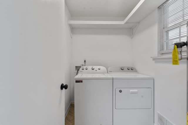 3363 Saddlebrook Dr, Hephzibah, GA 30815 - washroom featuring washing machine and clothes dryer, baseboards, and brick patterned flooring