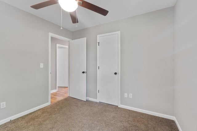 3363 Saddlebrook Dr, Hephzibah, GA 30815 - unfurnished bedroom with carpet floors, baseboards, and ceiling fan
