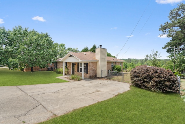 3363 Saddlebrook Dr, Hephzibah, GA 30815 - ranch-style house featuring brick siding, a chimney, a porch, and concrete driveway