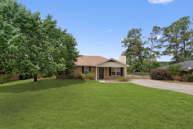3363 Saddlebrook Dr, Hephzibah, GA 30815 - ranch-style house featuring a chimney, concrete driveway, brick siding, and covered porch