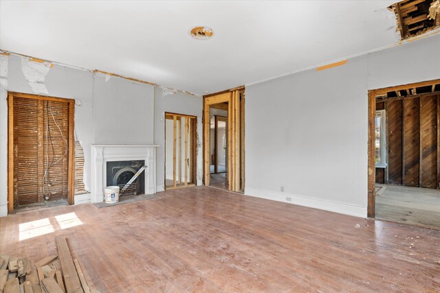 946 Milledge Rd, Augusta, GA 30904 - unfurnished living room featuring a high end fireplace and wood finished floors