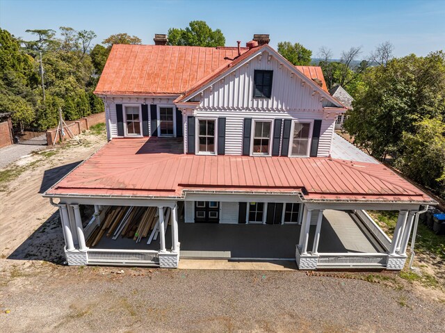 946 Milledge Rd, Augusta, GA 30904 - back of property with a chimney, board and batten siding, and a metal roof