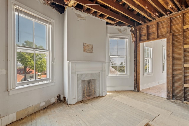 946 Milledge Rd, Augusta, GA 30904 - unfurnished living room featuring a premium fireplace and wood-type flooring
