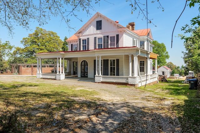 946 Milledge Rd, Augusta, GA 30904 - rear view of property with a porch, board and batten siding, and a chimney