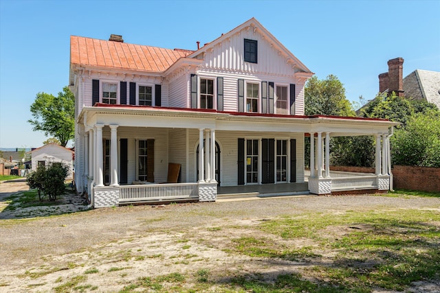 946 Milledge Rd, Augusta, GA 30904 - back of property with a porch, a chimney, and board and batten siding