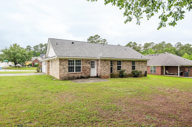 3007 Ashland Way, Grovetown, GA 30813 - rear view of property with brick siding, a patio, and a lawn
