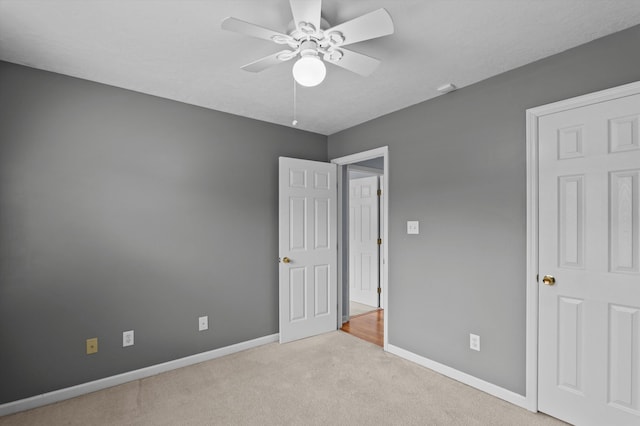 3007 Ashland Way, Grovetown, GA 30813 - unfurnished bedroom with baseboards, carpet, and ceiling fan