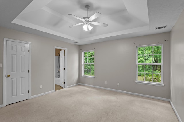 3007 Ashland Way, Grovetown, GA 30813 - unfurnished bedroom featuring a tray ceiling and baseboards