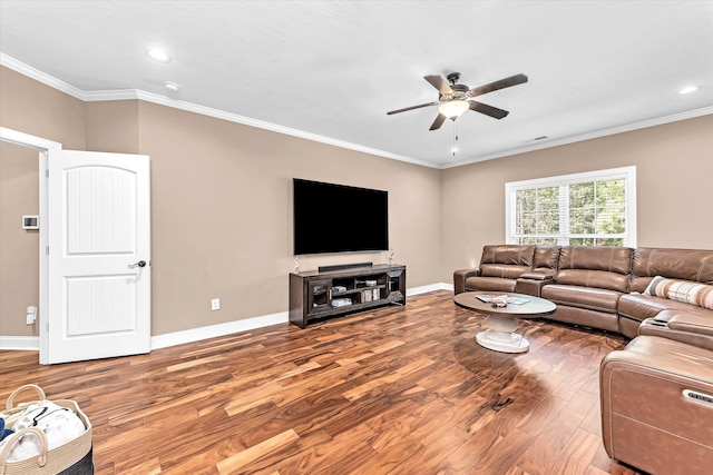 living room with ornamental molding, hardwood / wood-style floors, and ceiling fan