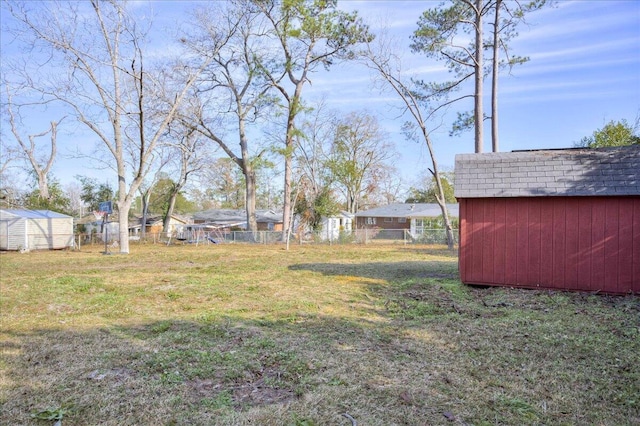 view of yard with a storage shed