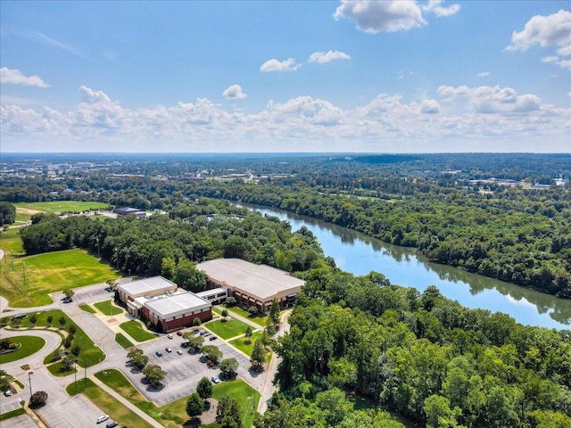 bird's eye view featuring a view of trees and a water view