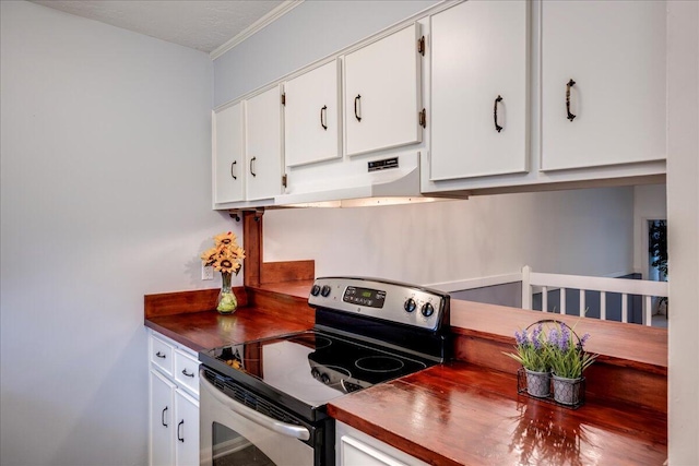 kitchen featuring under cabinet range hood, white cabinets, stainless steel electric range, and dark countertops