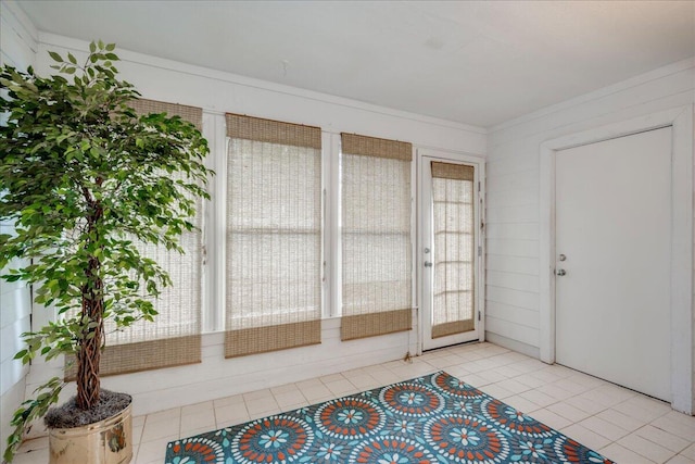 foyer entrance with light tile patterned floors