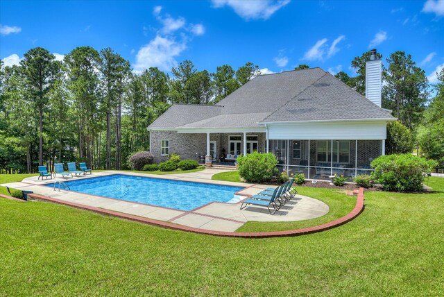 3005 Timber Woods Dr, Appling, GA 30802 - outdoor pool featuring a patio area, a yard, and a sunroom
