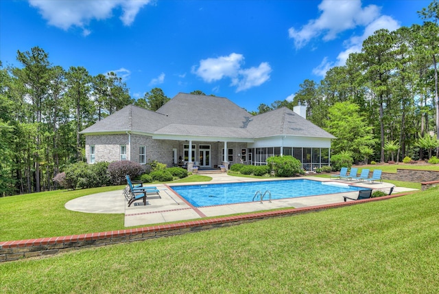 3005 Timber Woods Dr, Appling, GA 30802 - outdoor pool featuring a patio, a lawn, and a sunroom