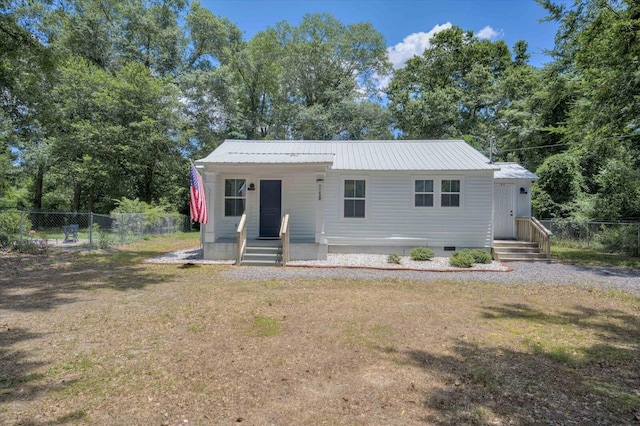 view of front of house with a front lawn