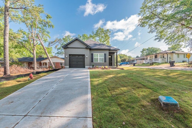 1717 Plank Rd, North Augusta, SC 29841 - view of front of house featuring a front yard, an attached garage, and concrete driveway