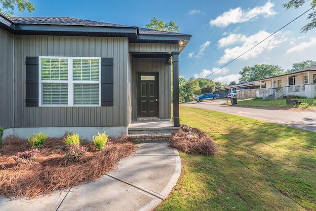 1717 Plank Rd, North Augusta, SC 29841 - entrance to property featuring board and batten siding and a lawn