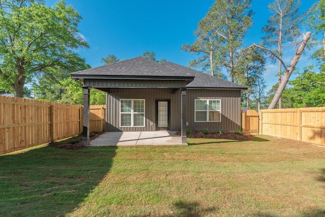 1717 Plank Rd, North Augusta, SC 29841 - rear view of property featuring a yard, a fenced backyard, a patio area, and roof with shingles
