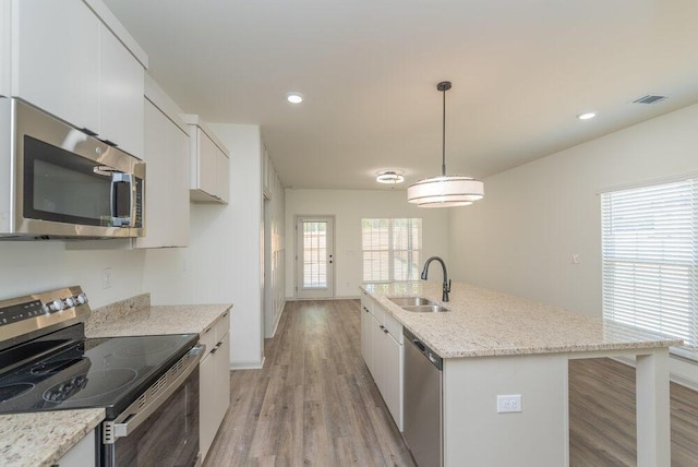 1717 Plank Rd, North Augusta, SC 29841 - kitchen featuring visible vents, white cabinets, a sink, appliances with stainless steel finishes, and light wood-style floors