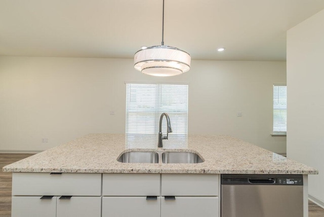 1717 Plank Rd, North Augusta, SC 29841 - kitchen with wood finished floors, stainless steel dishwasher, a sink, and light stone counters