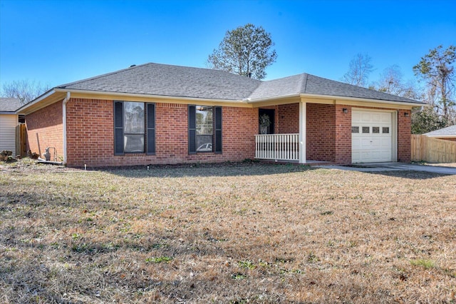 ranch-style house with a front lawn and a garage