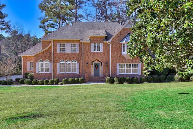 view of front of home with a front yard