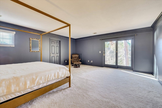 bedroom featuring carpet floors, multiple windows, access to outside, and crown molding