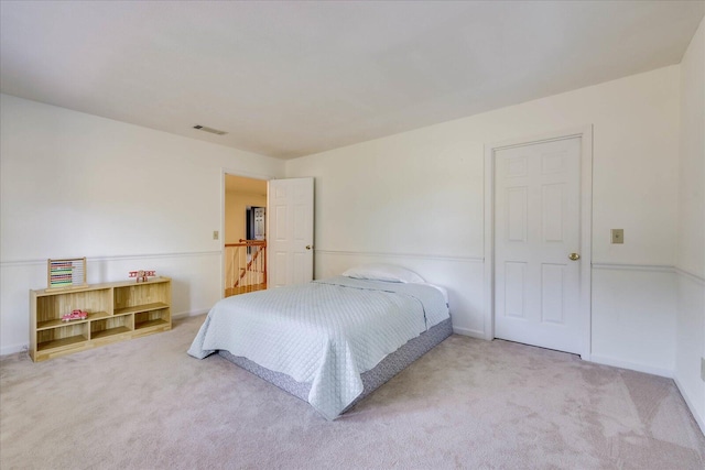 bedroom featuring carpet