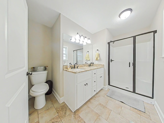 165 Sudlow Lake Rd, Graniteville, SC 29829 - full bathroom with baseboards, double vanity, a shower stall, and toilet