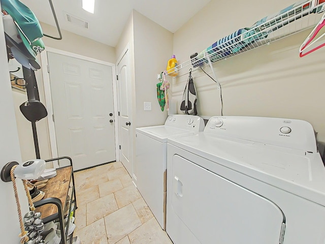 165 Sudlow Lake Rd, Graniteville, SC 29829 - laundry room featuring independent washer and dryer and light stone finish flooring