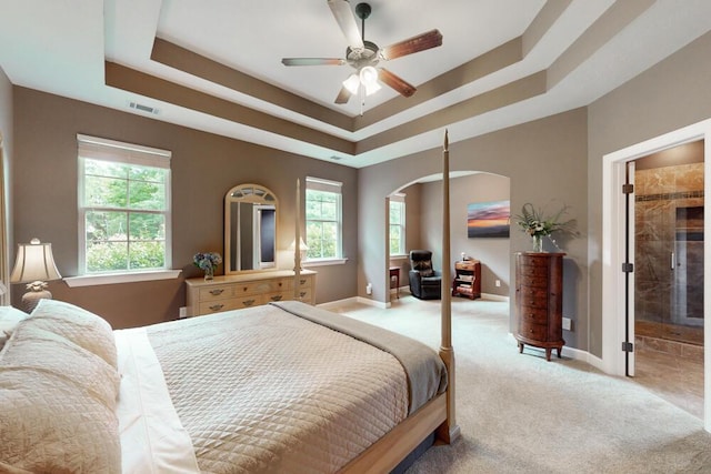 3039 Tarleton Ct, Beech Island, SC 29842 - bedroom with light carpet, a raised ceiling, and arched walkways