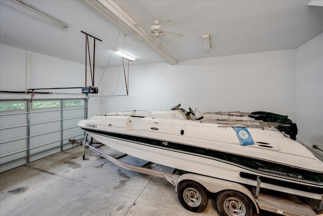 1034 N Pointe Ct, Tignall, GA 30668 - garage with a ceiling fan