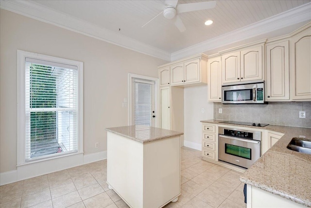 1034 N Pointe Ct, Tignall, GA 30668 - kitchen featuring stainless steel appliances, crown molding, ceiling fan, light tile patterned flooring, and tasteful backsplash