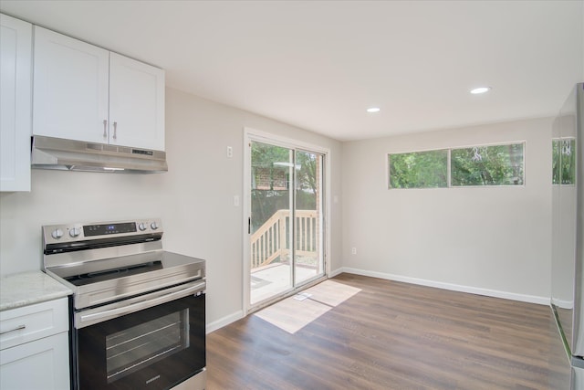 2148 Reedale Ave, Augusta, GA 30906 - kitchen featuring wood finished floors, stainless steel range with electric stovetop, white cabinets, and under cabinet range hood