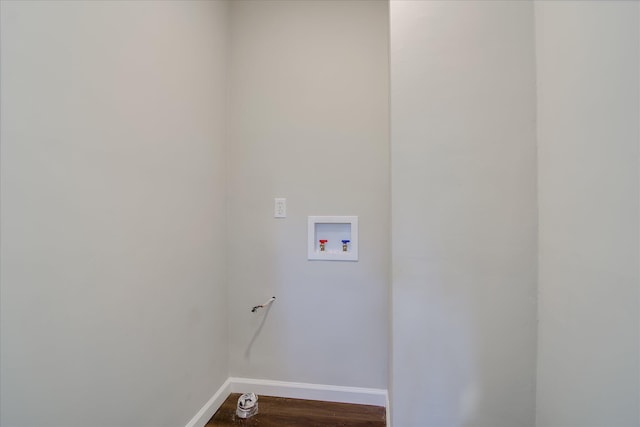 2148 Reedale Ave, Augusta, GA 30906 - clothes washing area featuring dark wood-style floors, washer hookup, laundry area, and baseboards