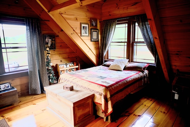 545 Beech Island Ave, Beech Island, SC 29842 - bedroom with light wood-type flooring and wooden walls