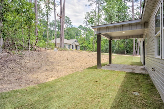 1962 Bunting Dr, North Augusta, SC 29841 - view of green lawn with a patio