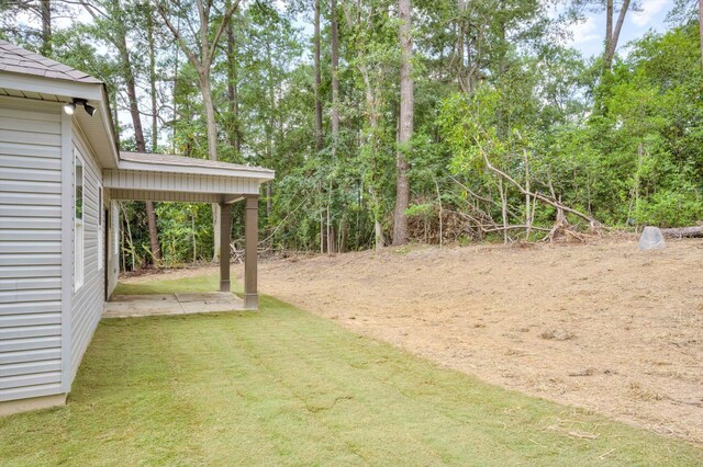 1962 Bunting Dr, North Augusta, SC 29841 - view of grassy yard with a patio area