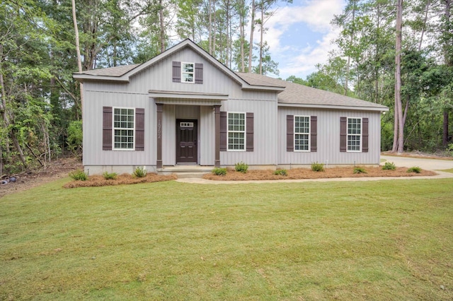 1962 Bunting Dr, North Augusta, SC 29841 - modern farmhouse with roof with shingles and a front lawn