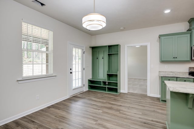 1962 Bunting Dr, North Augusta, SC 29841 - unfurnished dining area with light wood finished floors and baseboards