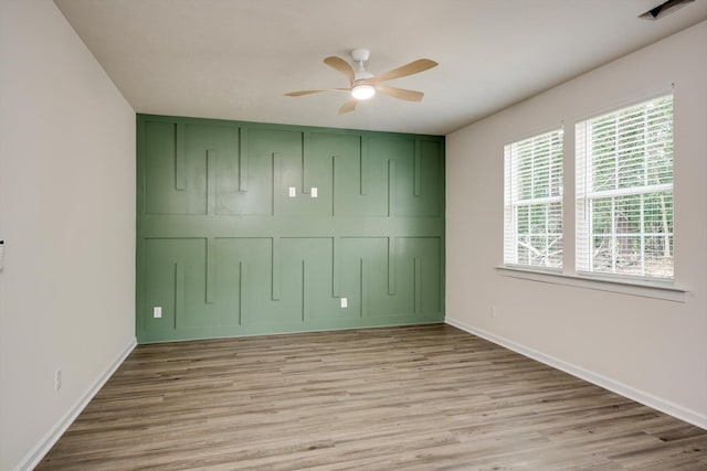 1962 Bunting Dr, North Augusta, SC 29841 - unfurnished bedroom with wood finished floors, ceiling fan, and a closet