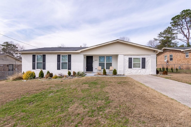 3609 Cameron Dr, Augusta, GA 30906 - single story home with brick siding, concrete driveway, a front lawn, and fence