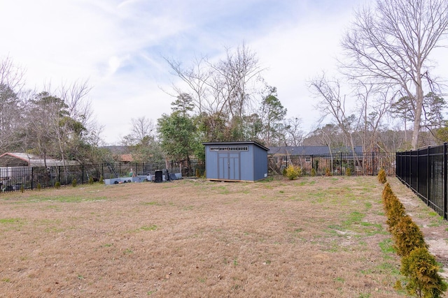 3609 Cameron Dr, Augusta, GA 30906 - view of yard with a fenced backyard, a storage unit, and an outdoor structure