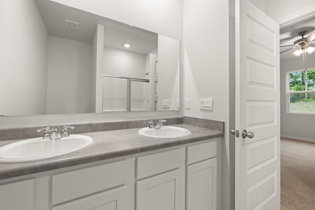 2912 Saltwater Bnd, Beech Island, SC 29842 - bathroom with a shower with door, vanity, and ceiling fan